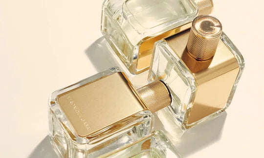 Three Veronique Gabai Signature Perfumes in 85ml sizes with beige background.  