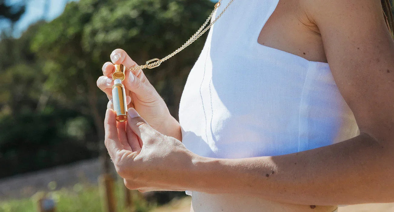 Female Model in vinyards of the south of france, wearing Le Spritz by Veronique Gabai in Gold.